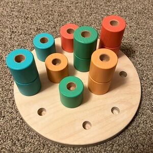 Wooden Stacking Pegboard by Lovevery